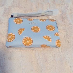 Coach wristlet NeW oranges 🍊